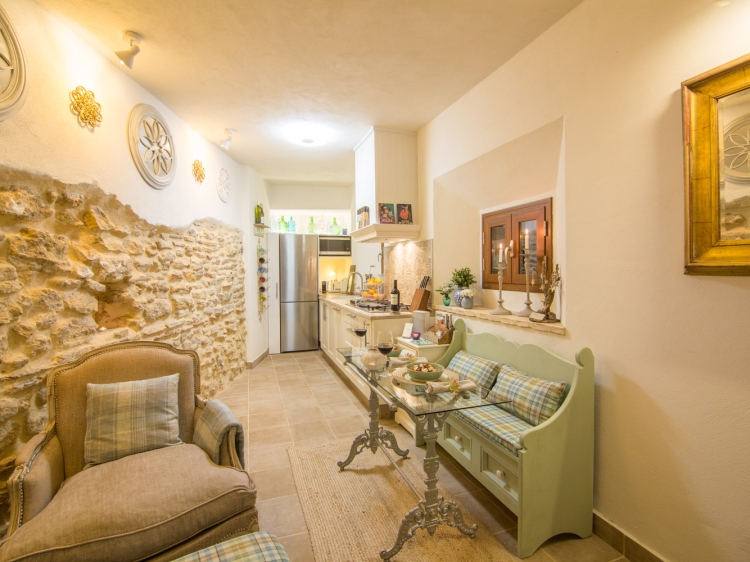 Charming rustic kitchen with all the appliances needed to rustle up an al fresco lunch or candle lit dinner in the patio 