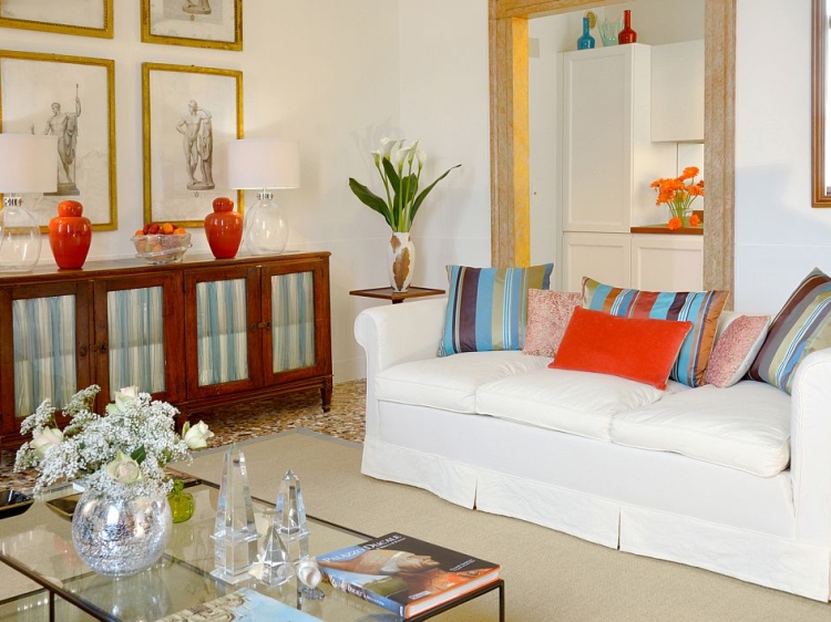 The living room of the Borsato apartment, with kitchen in the background