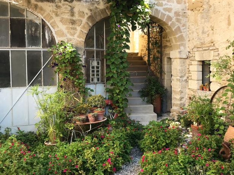 view of the courtyard, staircase leading to the swimming pool