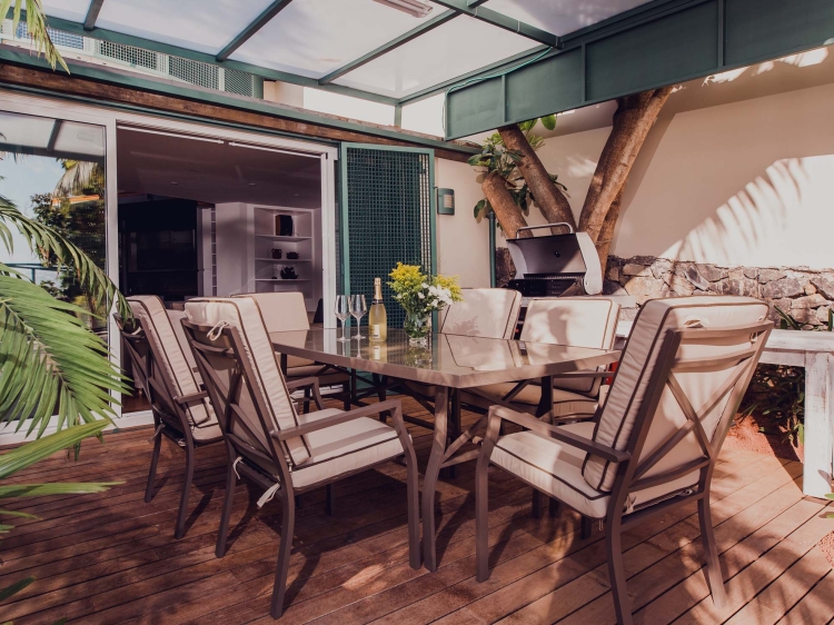 Outdoor dining area with gas BBQ