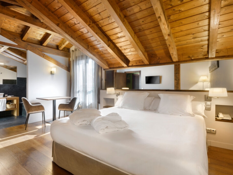 Junior suite with sloping ceilings.