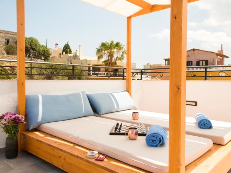 Rooftop sunbeds at boutique Hotel Port 7 in Agios Nikolaios