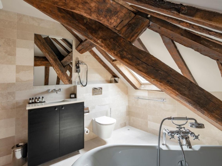 Bathroom in historic luxury hotel Le Presbytère in Paris