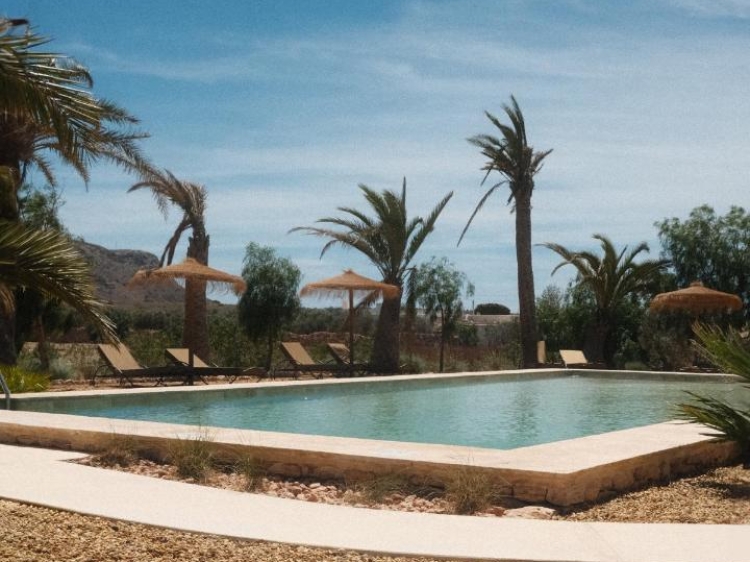 Swimming pool at boutique hotel Equilicuà Agua Amarga Spain