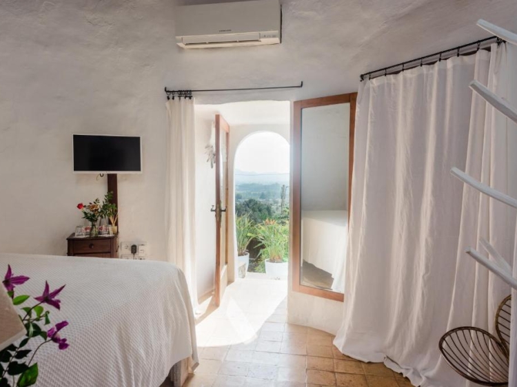secretplaces boutique hotel Ibiza historic hotel rustic style incredible hotels Ibiza room with view 