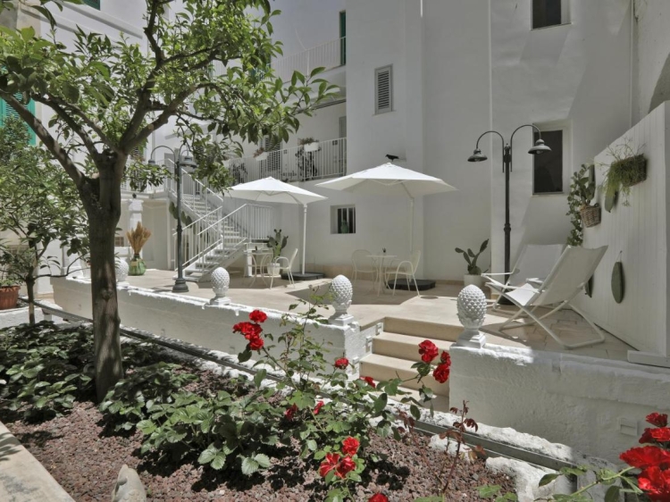 CSA - Corte Sant'Angelo - Suite Monopoli Bari. Charmoso aparthotel em Bari. Quartos com cozinha. Hotéis para famílias. Os melhores hotéis no centro de Monopoli. 