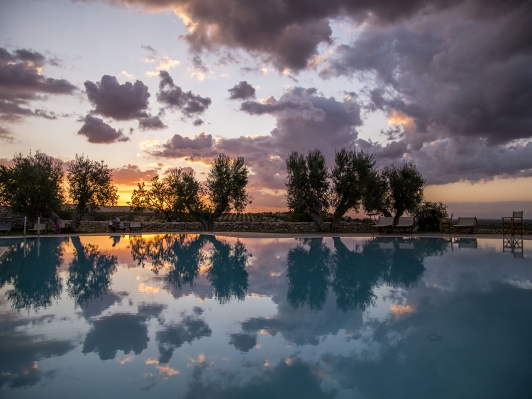 Swimming pool at sunset Lama di Luna best boutique rural hotel in puglia