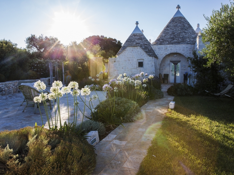 Traditional house within beautiful garden